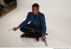 Garson SITTING POSE WITH GUNS